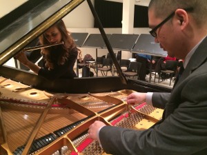 Shivhan Dohse and Xingzimin Pan rehearse Pan's work Kaidan .